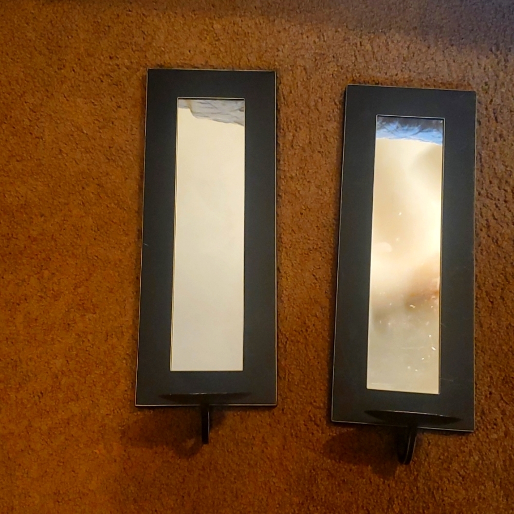 Wall mirror with candle holders